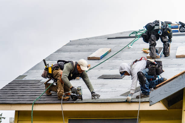 Professional Gutter Installation technician working in Athens, IN